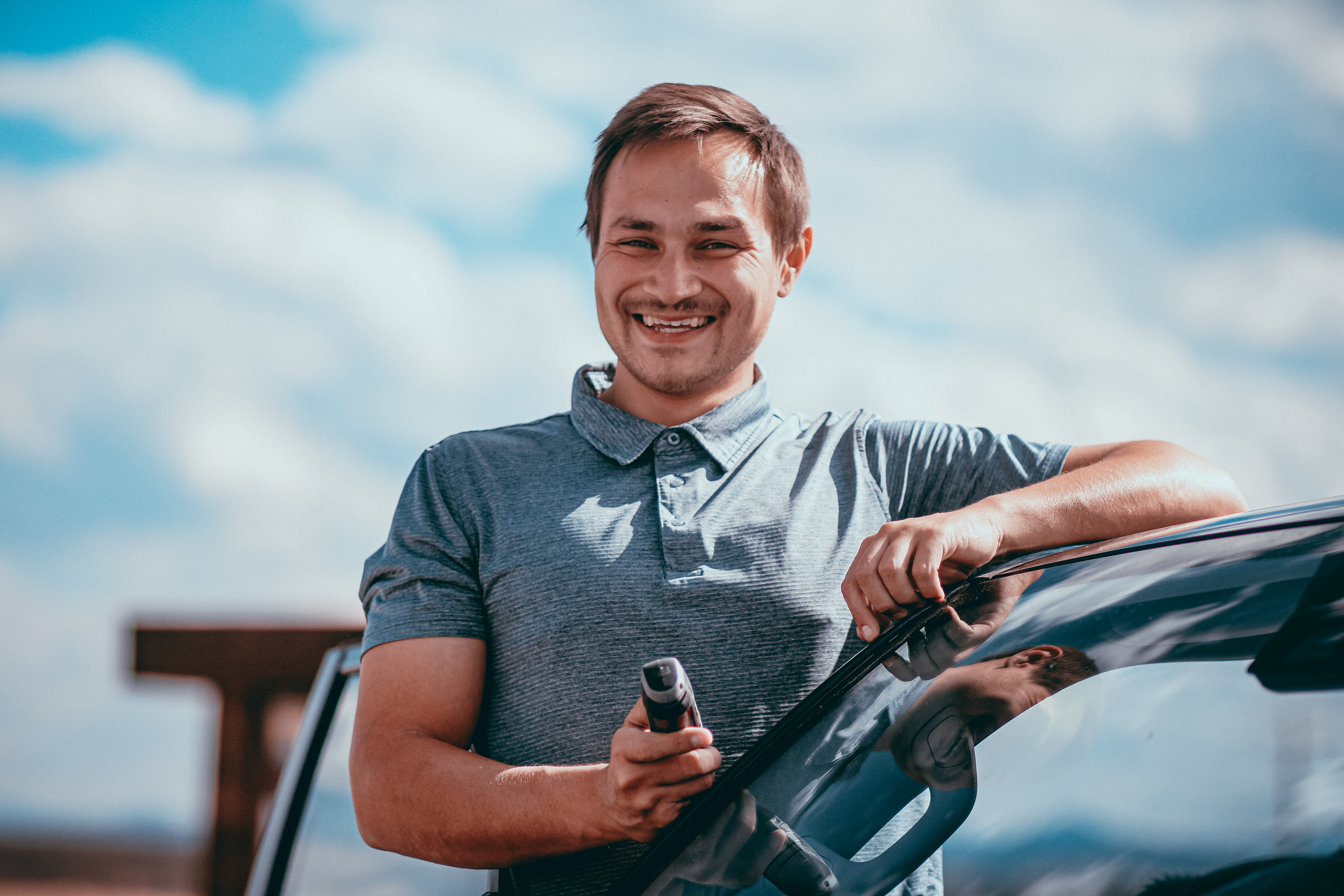 Mile High Auto Glass Owner performing mobile auto glass service